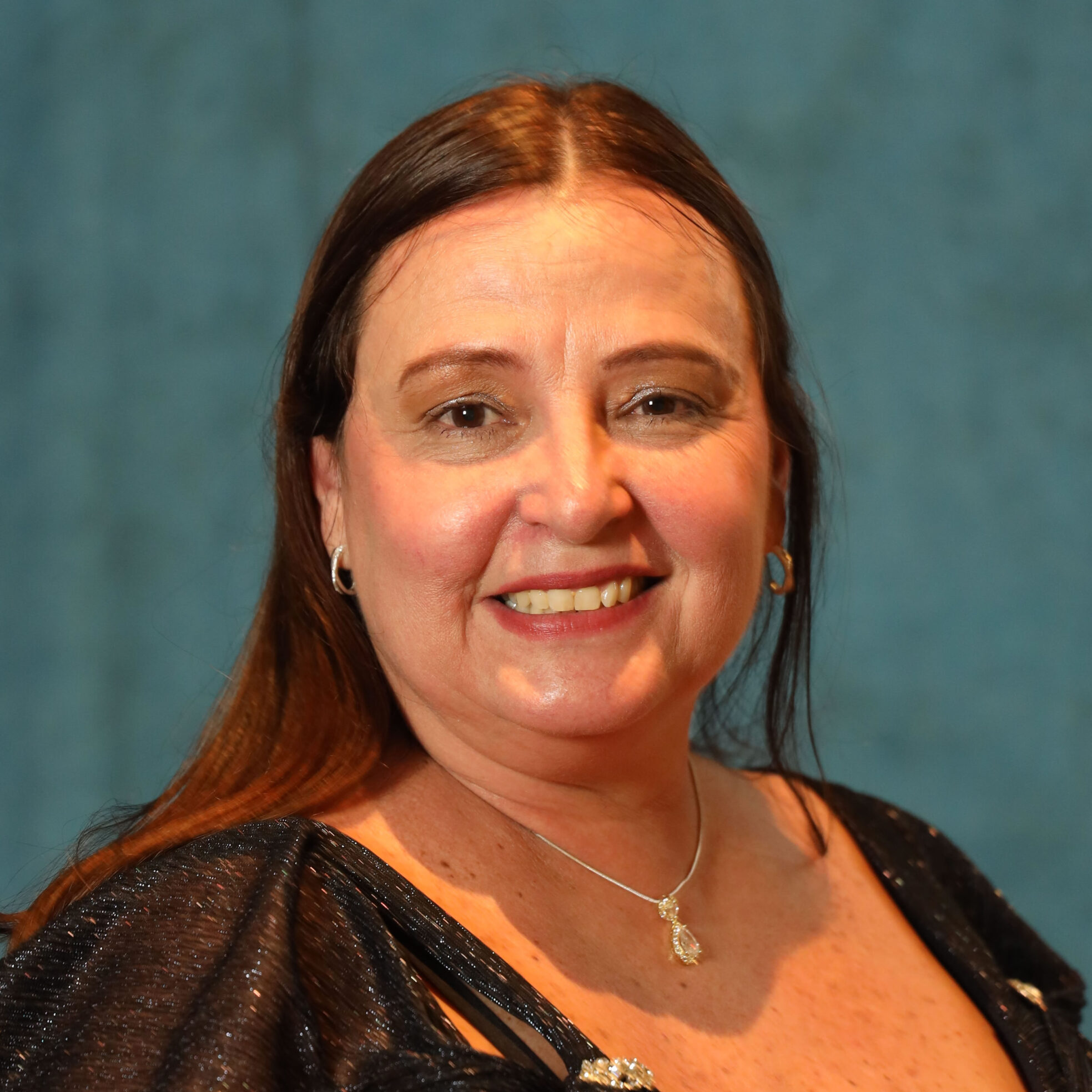 Bio - Dulce Oliveros - Manager of Programs